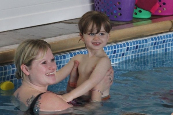 happy child swimming