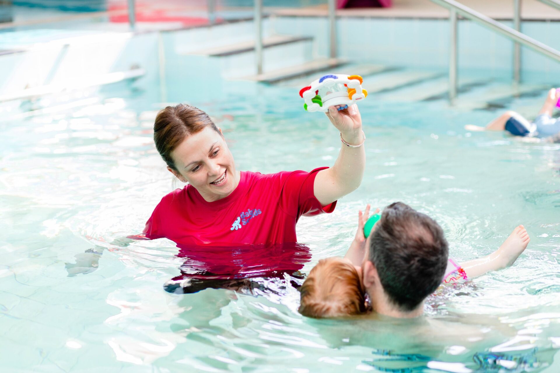 children having fun in swimming pool